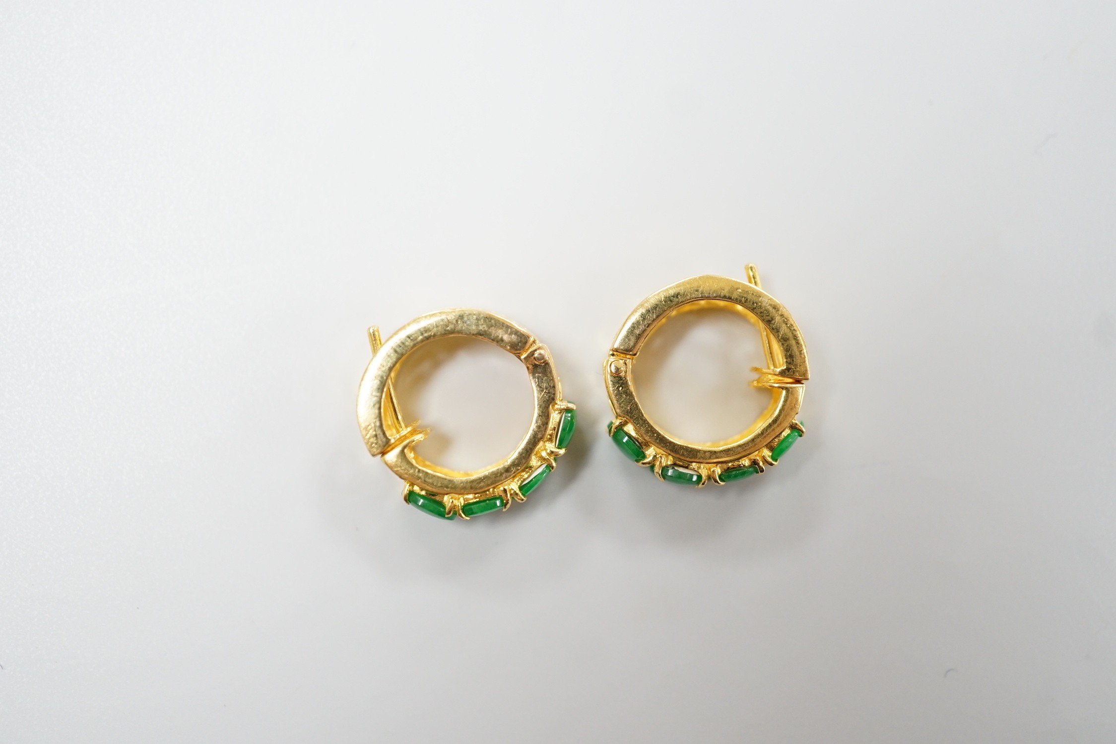 A modern pair of yellow metal, stamped 850, and four stone cabochon jade set hoop earrings, 14mm, gross weight 3.6 grams.